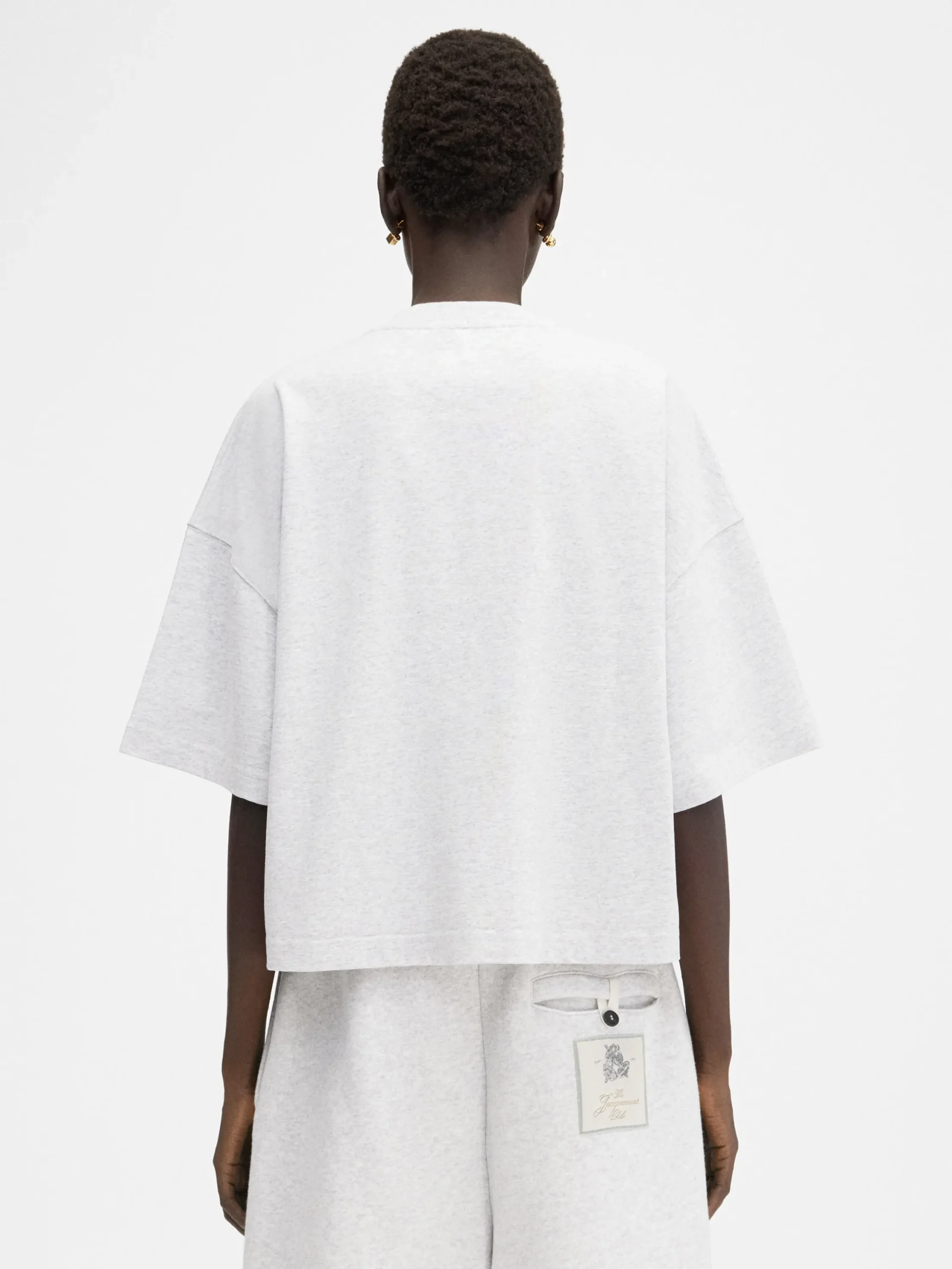 Le t-shirt Corto